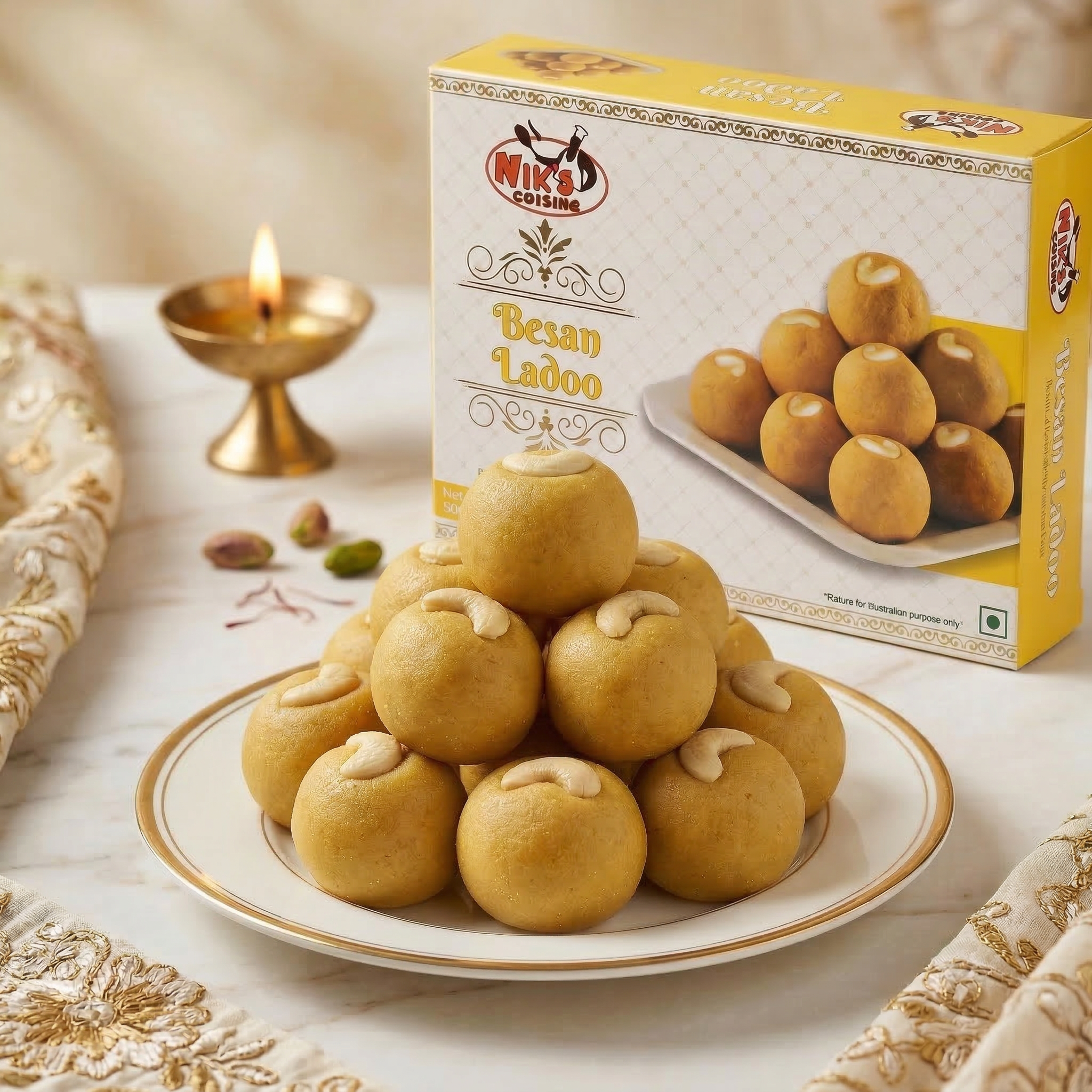 freepik__show-more-laddoos-in-plate__81510.png Besan Ladoo (500g) | Nik’s Cuisine - Image 1
